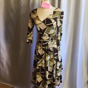 Wrap style dress with matching belt in size 4 by PANIZ geo pattern
